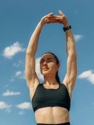 Woman stretching her arms